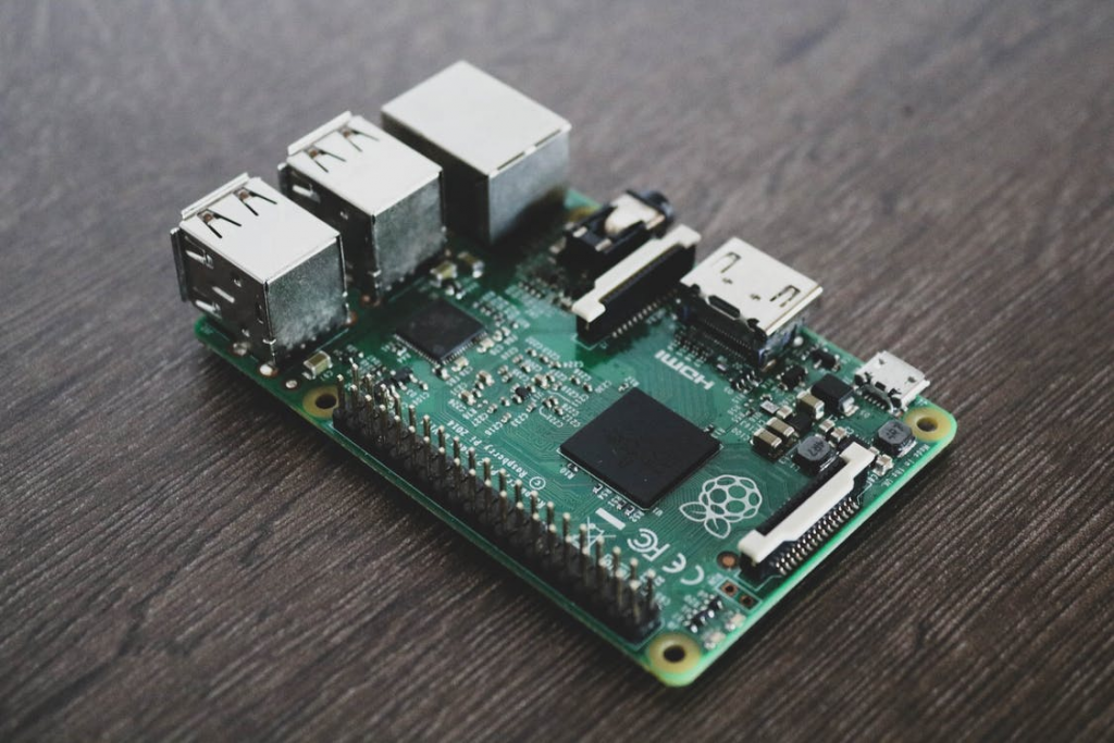 A silver and green circuit board