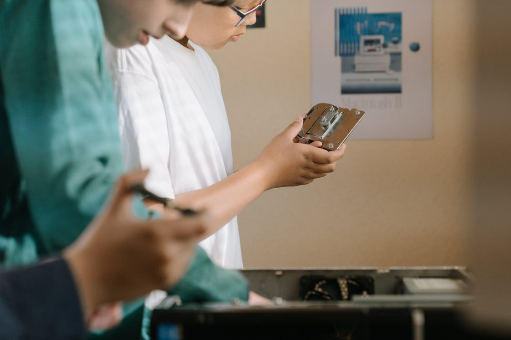 Two people working in an assembly line