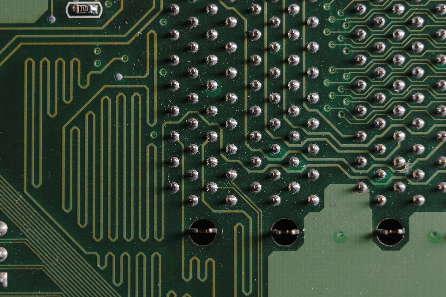 closeup of a green PCB