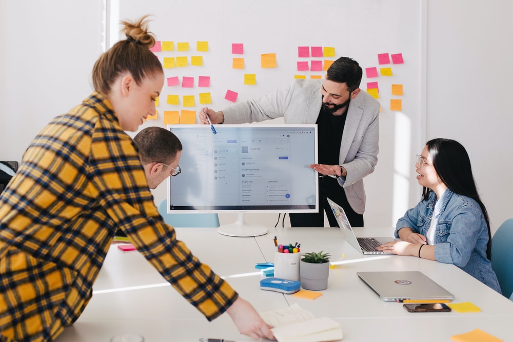 a group of people brainstorming product launch ideas.