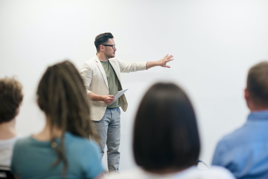 a man pitching an idea to EMS providers.